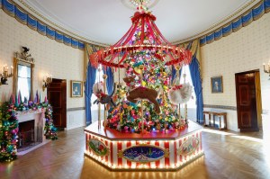 A carousel surrounds the White House Christmas Tree during a media preview of the 2024 holiday decorations at the White House  on December 02, 2024 in Washington, DC.