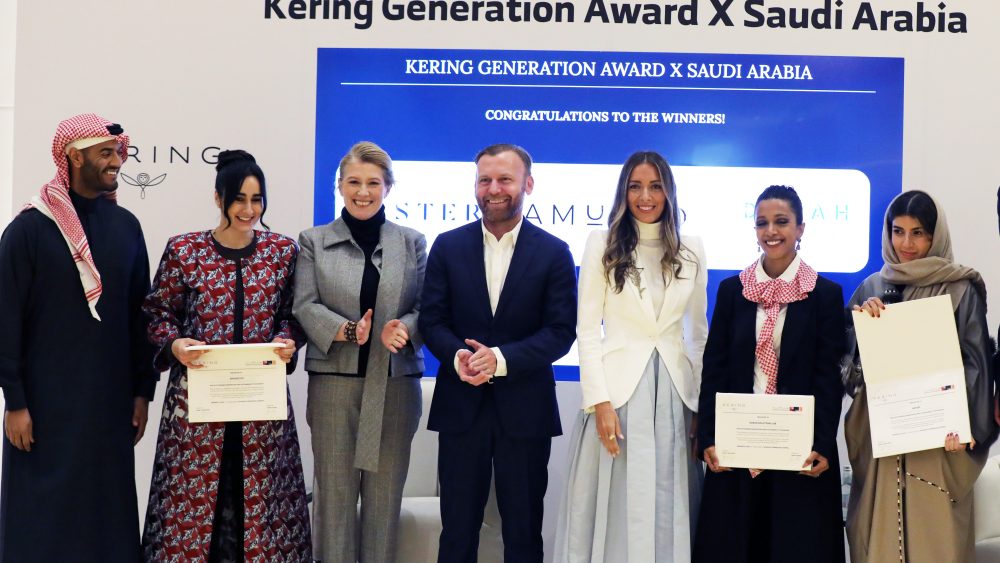 The winners of the Kering Generation Award X Saudi Arabia pose with Marie-Claire Daveu, Burak Cakmak and Miral Youssef