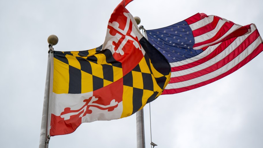 Maryland's state flag flies next to U.S. flag.
