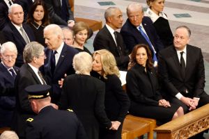 WASHINGTON, DC - JANUARY 09: U.S. President Joe Biden and first lady Jill Biden greet James "Chip" Carter and his wife Becky Carter during the state funeral for former U.S. President Jimmy Carter at Washington National Cathedral on January 09, 2025 in Washington, DC. President Joe Biden declared today a national day of mourning for Carter, the 39th President of the United States, who died at the age of 100 on December 29, 2024 at his home in Plains, Georgia. (Photo by Chip Somodevilla/Getty Images)
