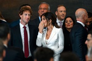 Mark Zuckerberg (L), chief executive of Meta, speaks with Amazon founder and owner of The Washington Post Jeff Bezos's partner Lauren Sanchez as Bezos (R) and Health Secretary nominee Robert Kennedy JR. (2nd L), before the inauguration of Donald Trump as the 47th president of the United States inside the Capitol Rotunda of the US Capitol building in Washington, DC, on January 20, 2025. Trump takes office for his second non-consecutive term as the 47th president of the United States. (Photo by Kenny HOLSTON / POOL / AFP) (Photo by KENNY HOLSTON/POOL/AFP via Getty Images)
