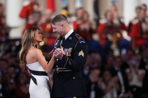 WASHINGTON, DC - JANUARY 20: First Lady Melania Trump dances with a service members at the Commander-in-Chief Ball on January 20, 2025 in Washington, DC.  President Trump attends some of the inaugural balls after taking the oath as the 47th president. (Photo by Andrew Harnik/Getty Images)
