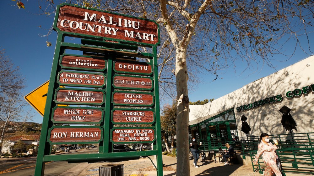 Visitors keep their distance and wear masks to Malibu Country Mart in the heart of Malibu.