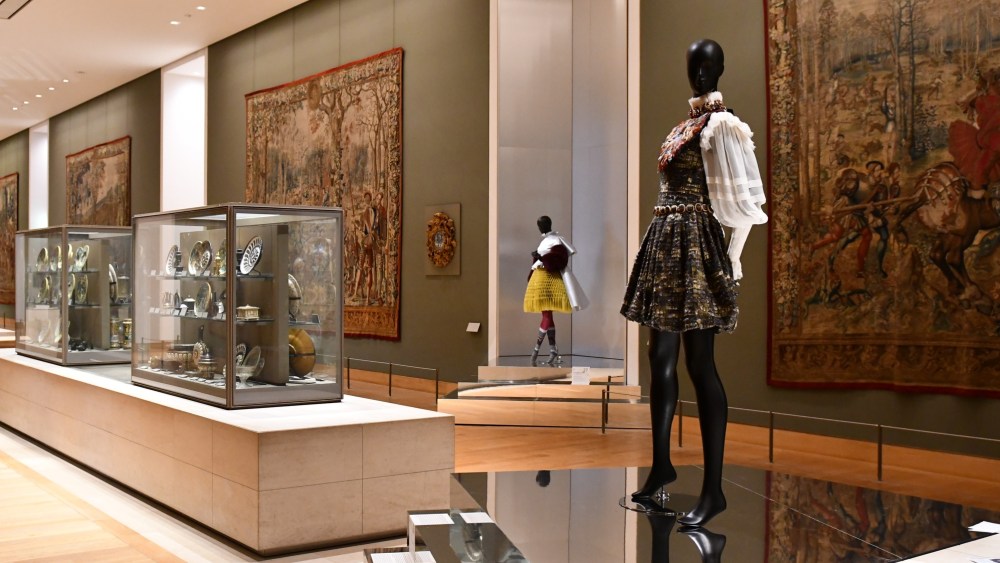 Looks by Undercover and Chanel (right) at the Louvre Museum's first fashion exhibition.