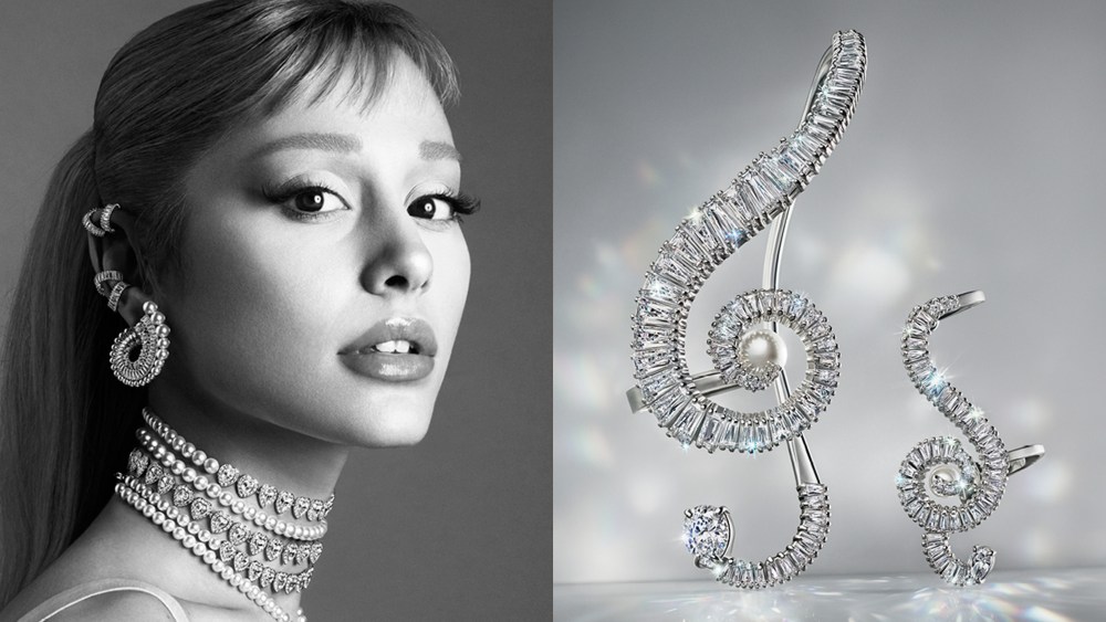 ariana grande wearing jewels from her swarovski collection; two earrings in the shape of treble clefs shimmering upright