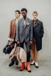 Backstage at Prada Men's Fall 2025 Ready-to-Wear Collection at Milan Fashion Week