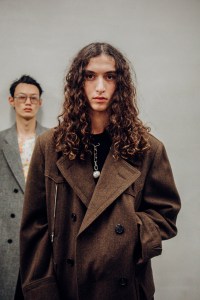 Backstage at Prada Men's Fall 2025 Ready-to-Wear Collection at Milan Fashion Week