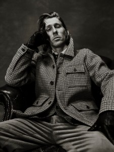 Brooks Brothers wool and polyester walking coat; cotton, wool and polyester sport coat; cotton shirt; cotton and elastane corduroy pants, and silk tie.