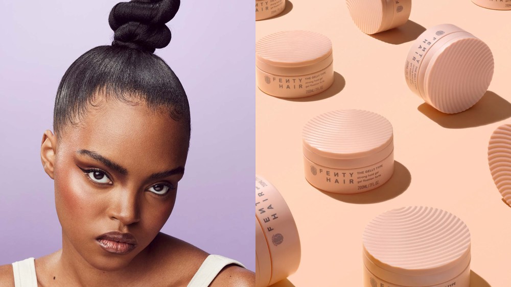 woman with a sleek updo staring fiercely at the camera; multiple containers of a hair gel from the brand Fenty Beauty