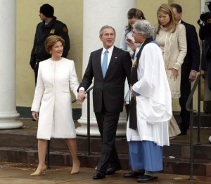 On the morning of his second inauguration, U.S. President George W. Bush  and first lady Laura Bush talk with Rev. Luis Leon after attending a church service at St. John?s Episcopal Church with daughters Barbara and Jenna in Washington on January 20, 2005. Bush will take the oath of office later today in front of the U.S. Capitol.