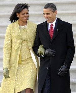 US President Barack Obama walks with his wife Michelle as they depart the US Capitol Building after Obama was sworn in as the 44th President of the United States during the 56th Presidential Inauguration ceremony in Washington, DC, 20 January 2009.