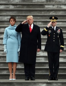 Donald Trump, with first lady Melania Trump and Maj. Gen. Bradley Becker review troops on the East Front of the U.S. Capitol on January 20, 2017 in Washington, DC. In today's inauguration ceremony Donald J. Trump becomes the 45th president of the United States.