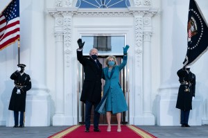 US President Joe Biden and First Lady Jill Biden wave as they arrive at the White House in Washington, DC, on January 20, 2021.