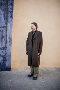 Street style at Pitti Uomo 107 in Florence, Italy, 2025.