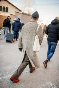 Street style at Pitti Uomo 107 in Florence, Italy, 2025.