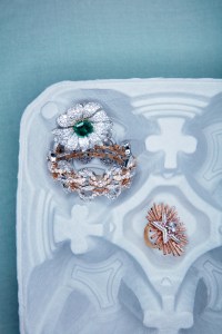 Van Cleef & Arpels “Flower” clip featuring emerald and diamonds set in Platinum, 18-karat white gold, and yellow gold and “Boogie-woogie” bracelet featuring diamonds set in 18-karat rose gold and white gold. Chanel High Jewelry Comete Aubazine ring in 18-karat pink gold, platinum,diamonds, pink sapphires.