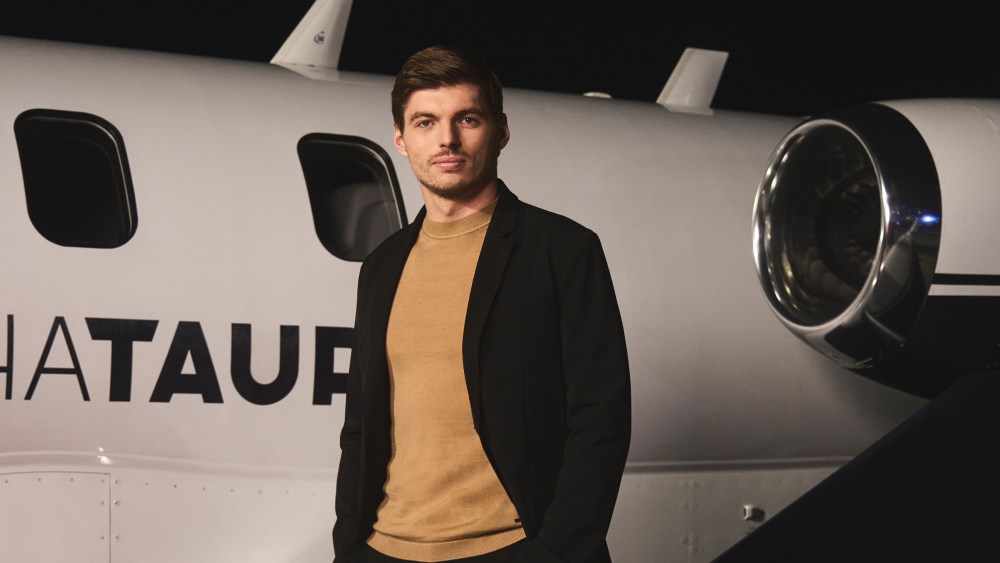 Max Verstappen poses for a portrait to announce his global partnership with AlphaTauri at Hangar-7 in Salzburg, AT on 16.12.2024