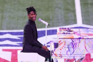 Jon Batiste performs at Super Bowl LIX at Caesars Superdome on February 09, 2025 in New Orleans, Louisiana.