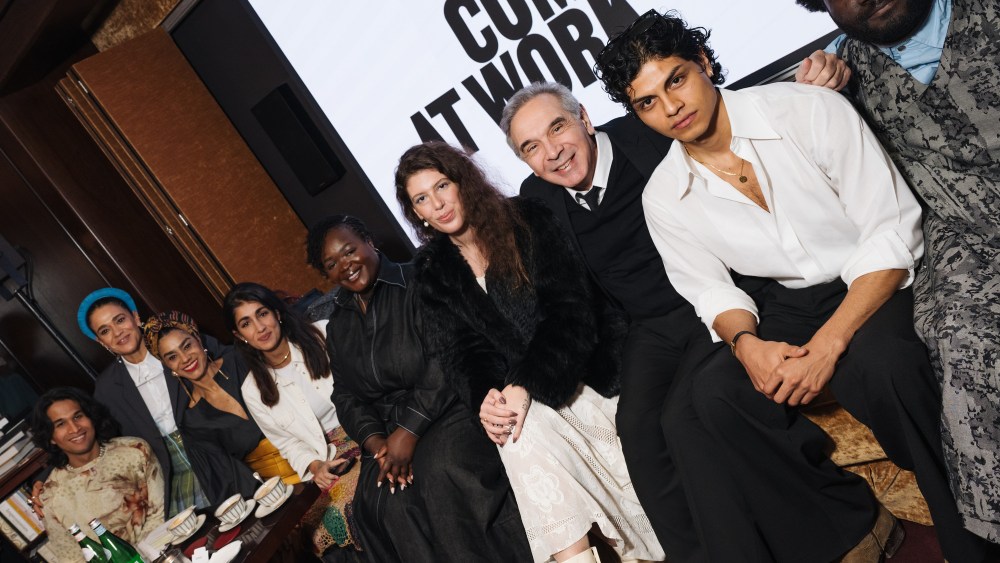 Carlo Capasa, president of Camera Nazionale della Moda Italiana and the Afro Fashion Association talents.