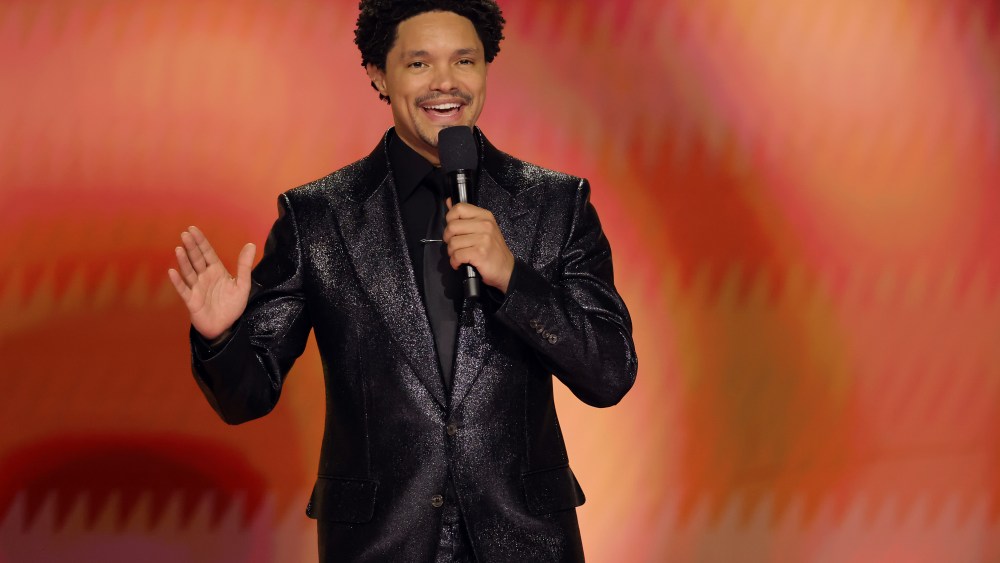 LOS ANGELES, CALIFORNIA - FEBRUARY 04: Trevor Noah speaks onstage during the 66th GRAMMY Awards at Crypto.com Arena on February 04, 2024 in Los Angeles, California. (Photo by Kevin Winter/Getty Images for The Recording Academy)