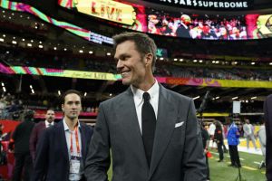 Retired football player and Fox analyst Tom Brady walks the sidelines before the start of Super Bowl LIX between the Kansas City Chiefs and the Philadelphia Eagles at Caesars Superdome in New Orleans, Louisiana, February 9, 2025. (Photo by TIMOTHY A. CLARY / AFP) (Photo by TIMOTHY A. CLARY/AFP via Getty Images)
