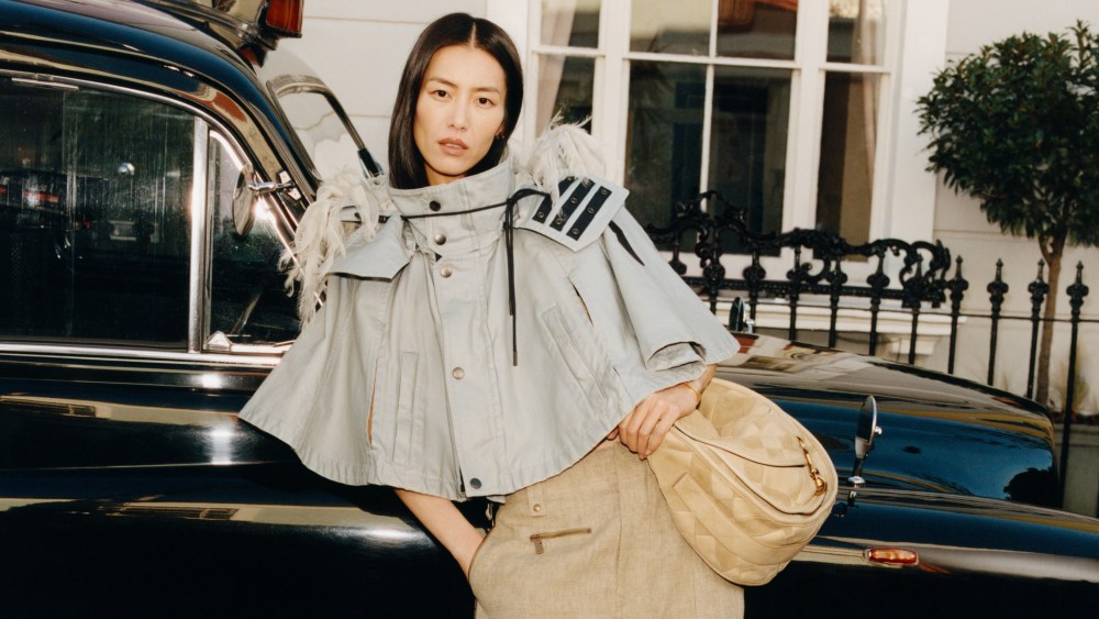 A look from Burberry's new summer 2025 campaign, which celebrates London in the rain.