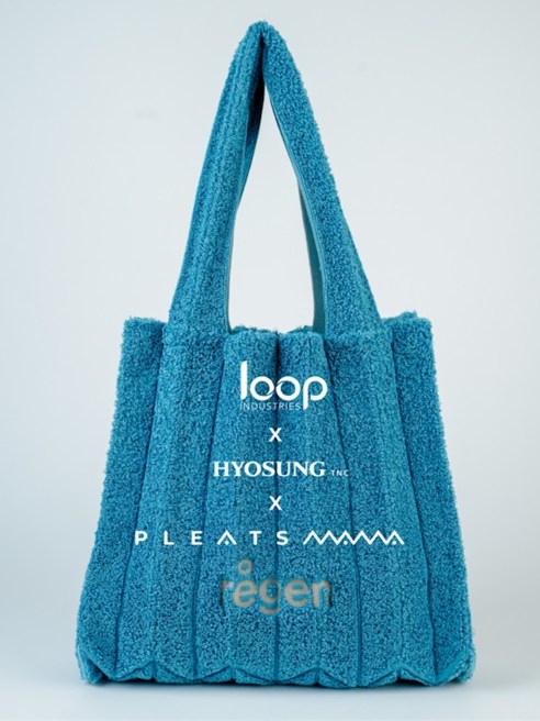 Loop supplied 100 percent recycled polyester chips. Hyosung transformed those chips into drawn-textured yarn. Pleatsmama made purses using that yarn.
