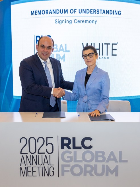 Brenda Bellei, White chief executive officer and Panos Linardos, resident of the RLC global forum, signing the memorandum of understanding.