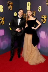 LONDON, ENGLAND - FEBRUARY 16: Adrien Brody and Georgina Chapman attend the EE BAFTA Film Awards 2025 at The Royal Festival Hall on February 16, 2025 in London, England. (Photo by John Phillips/BAFTA/Getty Images for BAFTA)
