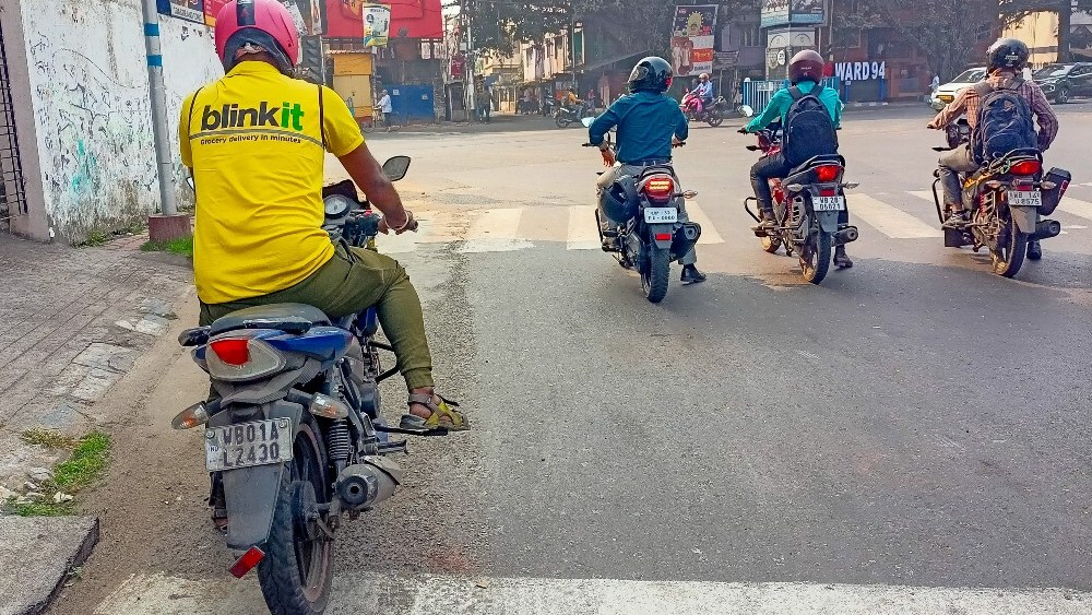 A Blinkit delivery driver in Kolkata, India.