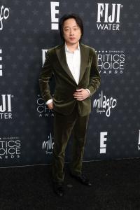 Jimmy O. Yang at the 30th Annual Critics Choice Awards held at The Barker Hangar on February 7, 2025 in Santa Monica, California.