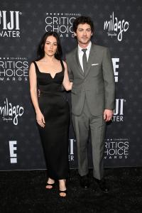 Analuisa Corrigan, Logan Lerman at the 30th Annual Critics Choice Awards held at The Barker Hangar on February 7, 2025 in Santa Monica, California.