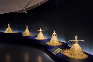 Small-scale reproductions of Guo Pei’s “Magnificent Gold” dress in the “Golden Thread” exhibition in Paris.