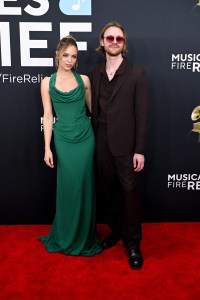 Claudia Sulewski in Vivienne Westwood with FINNEAS in Zegna
