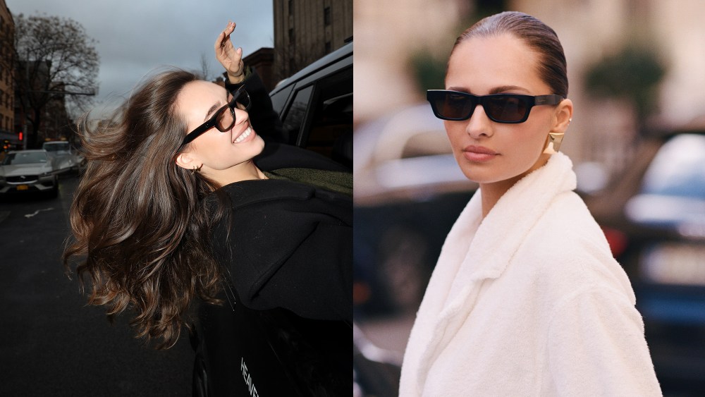 woman laughing while hanging out of a car window and wearing sunglasses; woman looking at the camera while wearing tinted shades and a white coat