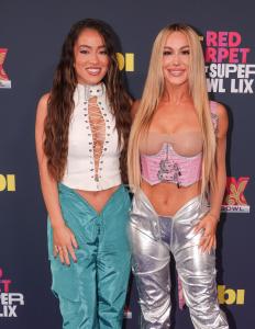 Steph Mi, Jamie Hauptmann at the Tubi Red Carpet during Super Bowl LIX at Caesars Superdome on February 09, 2025 in New Orleans, Louisiana.