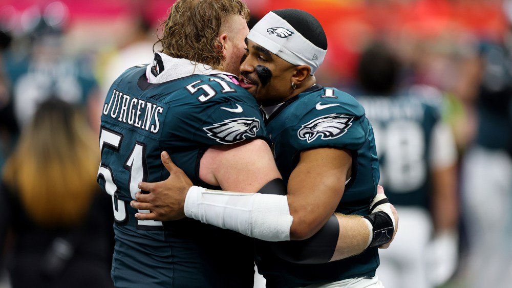 NEW ORLEANS, LOUISIANA - FEBRUARY 09: Cam Jurgens #51 and Jalen Hurts #1 of the Philadelphia Eagles celebrate in the fourth quarter against the Kansas City Chiefs during Super Bowl LIX at Caesars Superdome on February 09, 2025 in New Orleans, Louisiana. (Photo by Gregory Shamus/Getty Images)