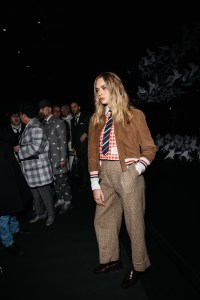 Cara Delevingne at the Thom Browne Fall RTW 2025 fashion show as part of New York Fashion Week held at The Shed on February 11, 2025 in New York, New York.
