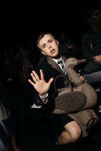 Cole Escola at the Thom Browne Fall RTW 2025 fashion show as part of New York Fashion Week held at The Shed on February 11, 2025 in New York, New York.