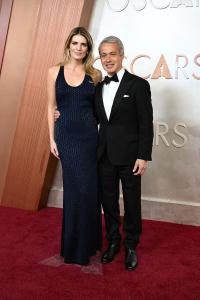 Natasha Schuetz, Andrew Lauren at the 97th Oscars held at the Dolby Theatre on March 2, 2025 in Hollywood, California.
