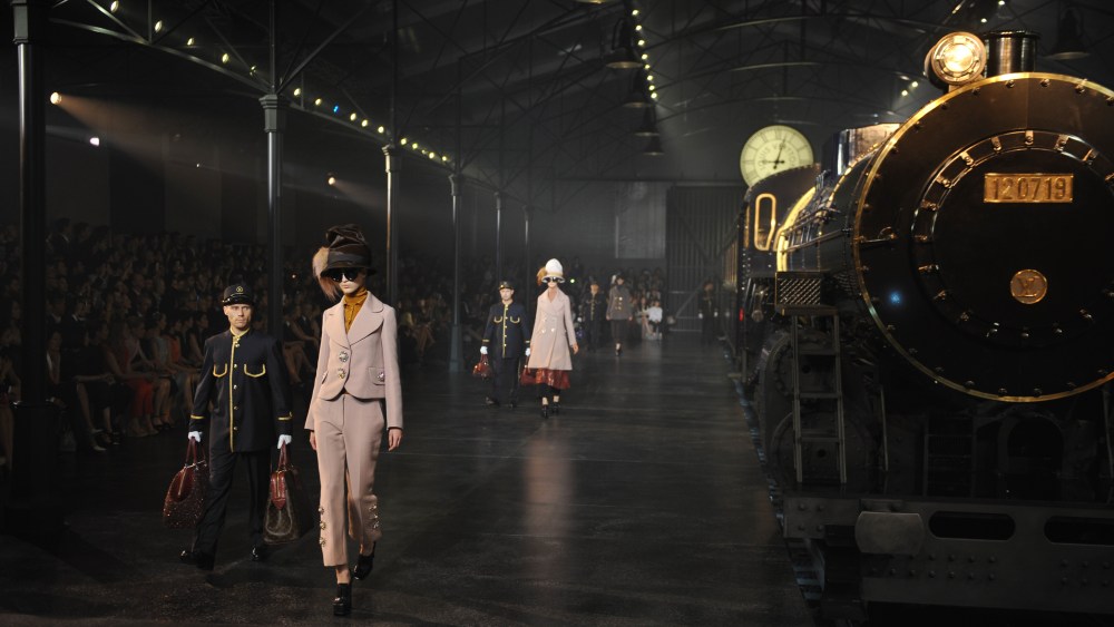 Models wear creations from the Louis Vuitton autumn / winter 2012 collection at their show in Shanghai on July 19, 2012. A Louis Vuitton "Mansion " is to open in Shanghai on July 21, the first such speciality store in China with personalisation possibilities. AFP PHOTO/Peter PARKS        (Photo credit should read PETER PARKS/AFP/GettyImages)
