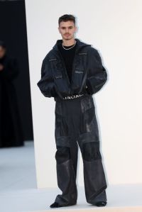 PARIS, FRANCE - MARCH 09: Romeo Beckham attends the Balenciaga Womenswear Fall/Winter 2025-2026 show as part of Paris Fashion Week  at Les Invalides on March 09, 2025 in Paris, France. (Photo by Pierre Suu/Getty Images)