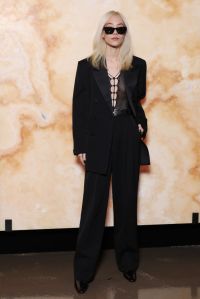 PARIS, FRANCE - MARCH 11: (EDITORIAL USE ONLY - For Non-Editorial use please seek approval from Fashion House) Kitty Chicha Amatayakul attends the Saint Laurent Womenswear Fall/Winter 2025-2026 show as part of Paris Fashion Week on March 11, 2025 in Paris, France. (Photo by Pascal Le Segretain/Getty Images)