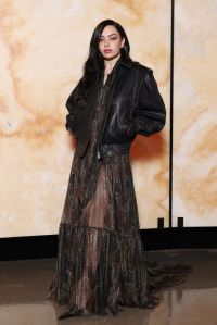 PARIS, FRANCE - MARCH 11: (EDITORIAL USE ONLY - For Non-Editorial use please seek approval from Fashion House) Charli XCX attends the Saint Laurent Womenswear Fall/Winter 2025-2026 show as part of Paris Fashion Week on March 11, 2025 in Paris, France. (Photo by Pascal Le Segretain/Getty Images)