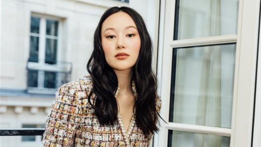 Yerin Ha gets ready for the Chanel fall 2025 show.