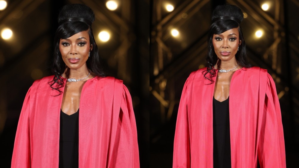 Naomi Campbell arrives at the Louvre’s Grand Fashion Dinner on March 4 in Paris, red robe, slipdress