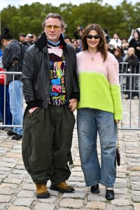 Daniel Craig and Rachel Weisz outside Paris Fashion Week in Loewe.