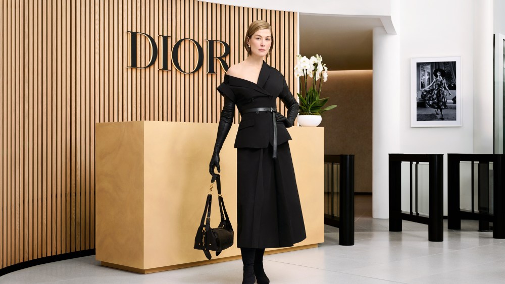Rosamund Pike stars as a Dior spokesperson in the parody film highlighting the new D-Journey bag.