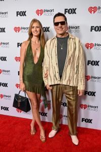 Annika Backes Verwest, Tiesto at the 2025 iHeartRadio Music Awards held at the Dolby Theatre on March 17, 2025 in Los Angeles, California.