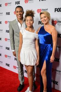 T. J. Holmes, Sabine Holmes, AMY ROBACH at the 2025 iHeartRadio Music Awards held at the Dolby Theatre on March 17, 2025 in Los Angeles, California.